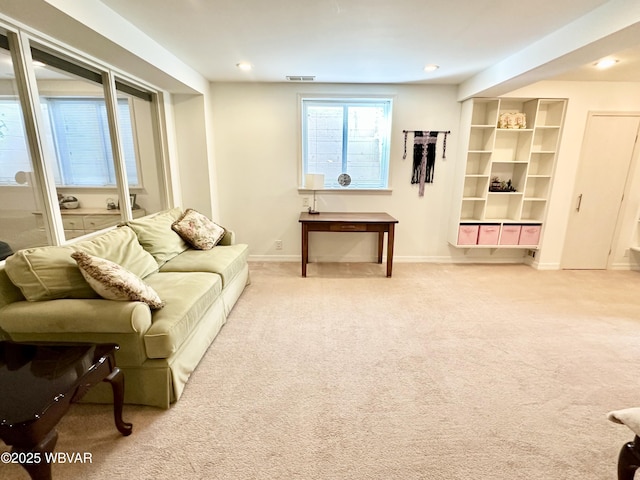 2035 Woodland Rd, Montoursville, PA 17754 - living room with light carpet, baseboards, and recessed lighting