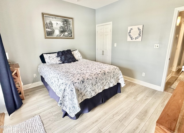 2035 Woodland Rd, Montoursville, PA 17754 - bedroom with light wood-style floors, baseboards, and a closet
