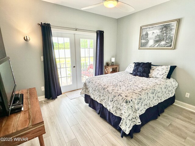 2035 Woodland Rd, Montoursville, PA 17754 - bedroom with light wood finished floors, access to exterior, french doors, and baseboards
