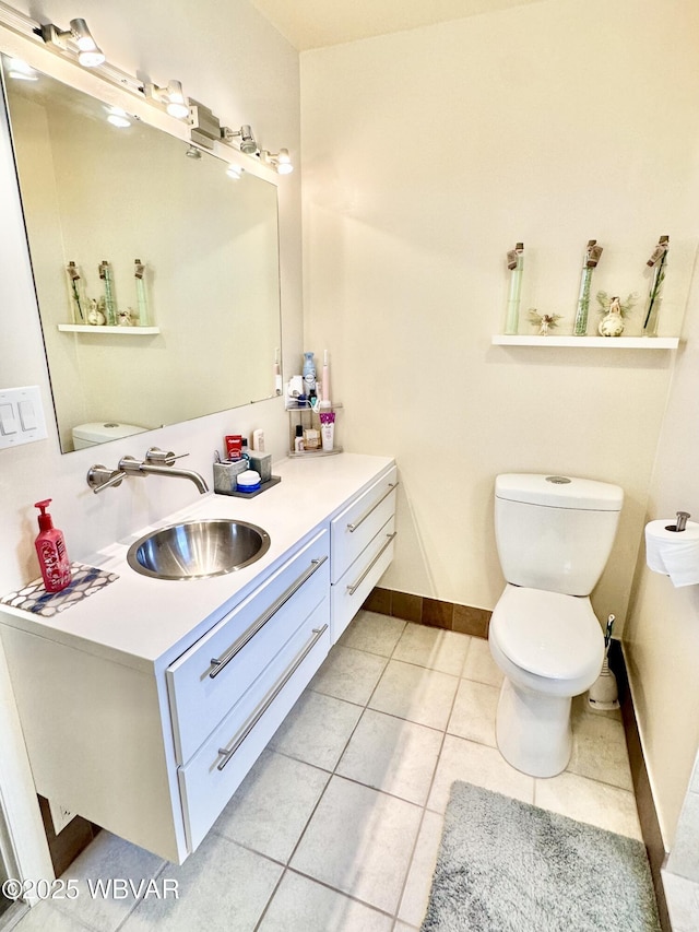2035 Woodland Rd, Montoursville, PA 17754 - bathroom featuring toilet, tile patterned floors, baseboards, and vanity