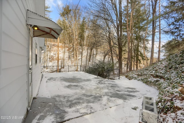 view of snow covered patio