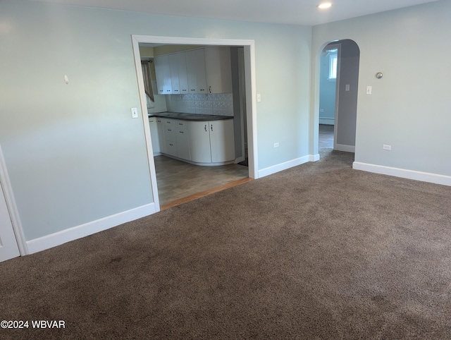 empty room featuring carpet flooring