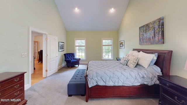 2180 Stopper Dr, Montoursville, PA 17754 - carpeted bedroom with high vaulted ceiling, baseboards, and recessed lighting