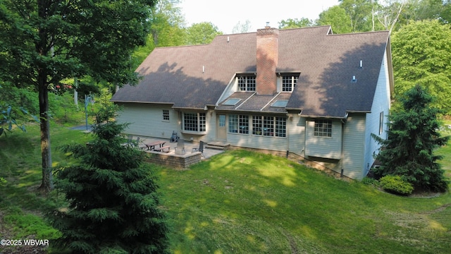 2180 Stopper Dr, Montoursville, PA 17754 - rear view of property with a patio area, a lawn, and a chimney