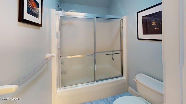 2180 Stopper Dr, Montoursville, PA 17754 - bathroom with toilet, tile patterned flooring, and bath / shower combo with glass door