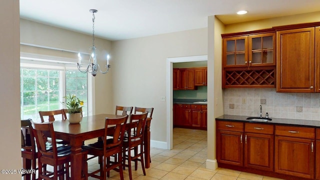 2180 Stopper Dr, Montoursville, PA 17754 - dining space with a chandelier, light tile patterned floors, and recessed lighting