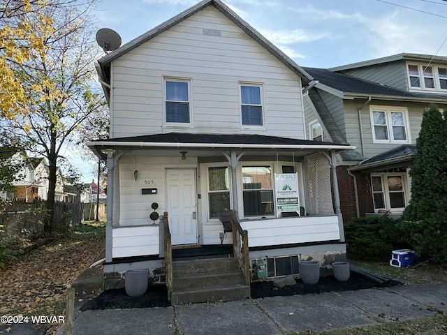 view of property featuring a porch