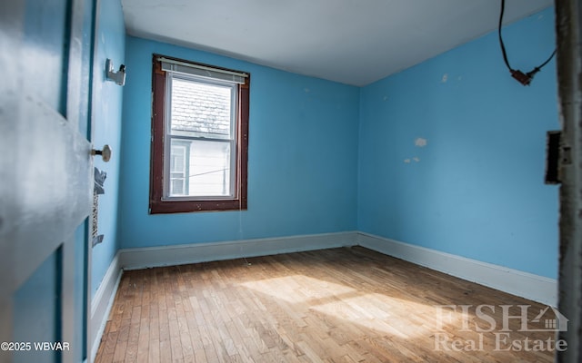 435 Grant St, Williamsport, PA 17701 - unfurnished room with baseboards and wood finished floors