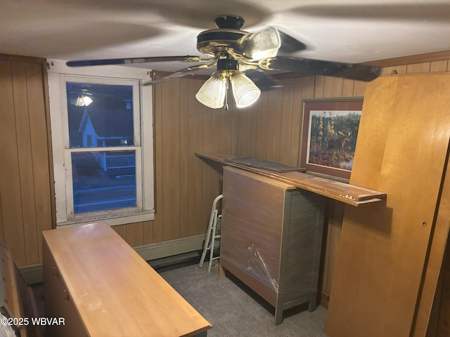 145 Gulick St, Blossburg, PA 16912 - interior space featuring carpet, a bar, ceiling fan, and wood walls