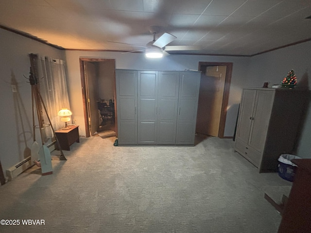 145 Gulick St, Blossburg, PA 16912 - bedroom featuring light colored carpet, a baseboard heating unit, and ceiling fan
