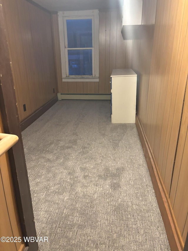 145 Gulick St, Blossburg, PA 16912 - interior space featuring wooden walls and a baseboard radiator