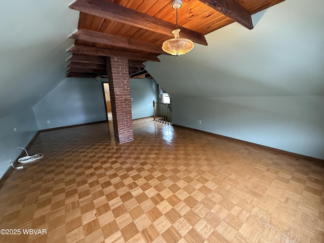 additional living space featuring vaulted ceiling with beams, parquet flooring, ornate columns, and wooden ceiling