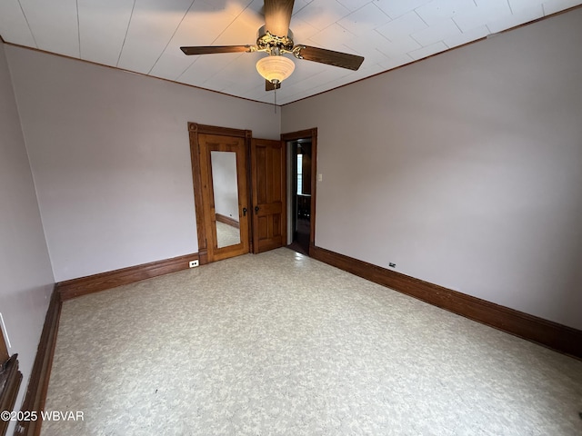 unfurnished room featuring ceiling fan