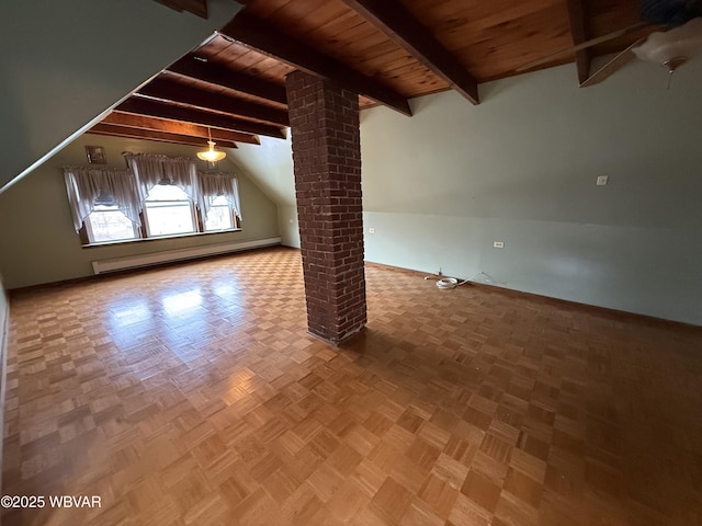 additional living space with parquet flooring, lofted ceiling with beams, wooden ceiling, a baseboard radiator, and decorative columns