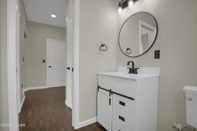1777 Felmey Rd, Winfield, PA 17889 - bathroom featuring vanity, wood finished floors, toilet, baseboards, and recessed lighting