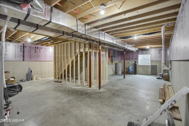 1777 Felmey Rd, Winfield, PA 17889 - below grade area featuring water heater and a water pressure tank