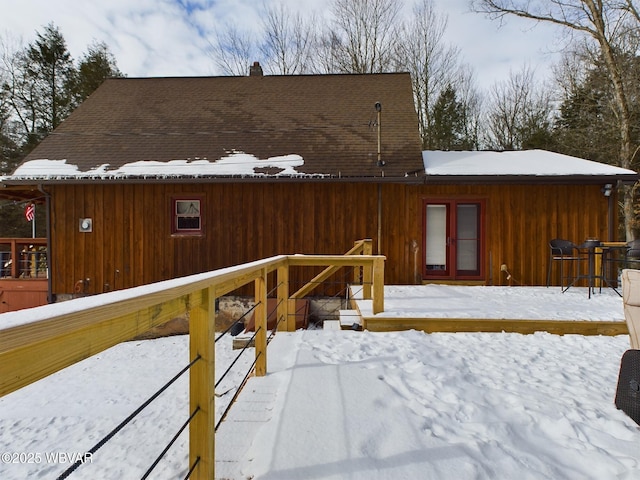 view of snow covered property