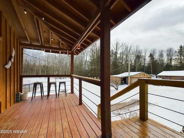 view of snow covered deck