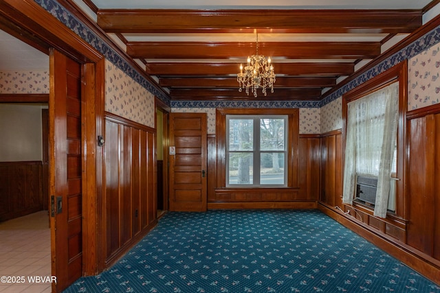 interior space featuring a chandelier and beamed ceiling