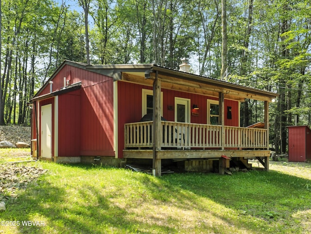 110 Worlds End Rd, Muncy Valley, PA 17758 - view of front of home featuring a chimney, a front lawn, and a porch