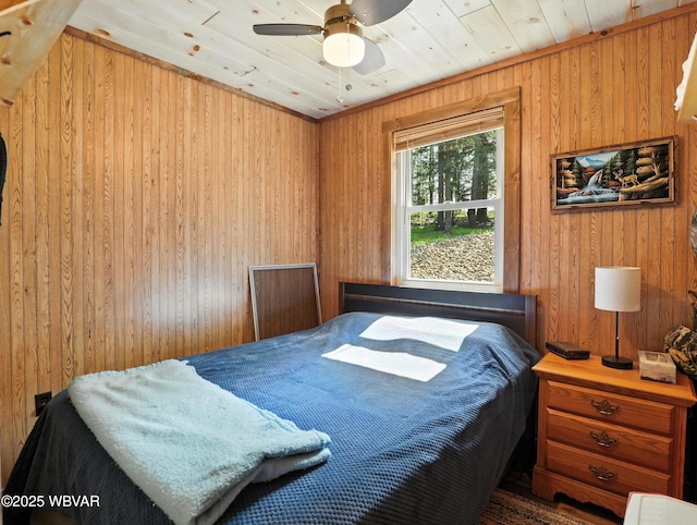 110 Worlds End Rd, Muncy Valley, PA 17758 - bedroom with wood walls and ceiling fan
