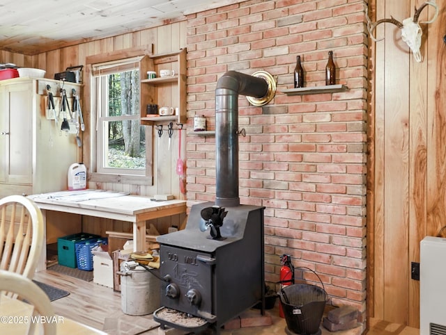 110 Worlds End Rd, Muncy Valley, PA 17758 - detailed view of wooden walls, a wood stove, wood ceiling, and brick wall