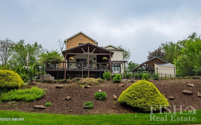 335 Chirlton Pt, Montoursville, PA 17754 - view of front of home featuring fence and a wooden deck