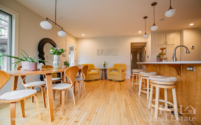 335 Chirlton Pt, Montoursville, PA 17754 - dining area with light wood-style floors and recessed lighting