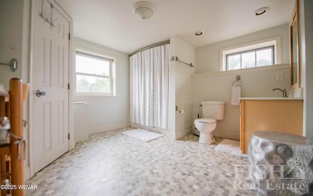 335 Chirlton Pt, Montoursville, PA 17754 - full bathroom featuring toilet, curtained shower, and baseboards