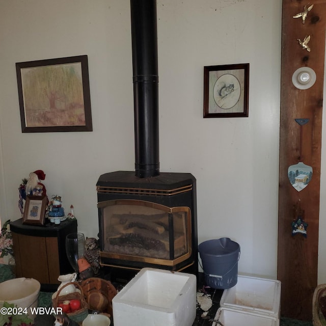 interior details featuring a wood stove