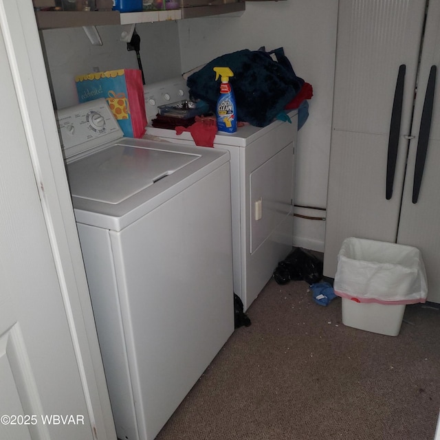 clothes washing area featuring washing machine and dryer