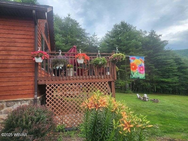 view of yard featuring a deck