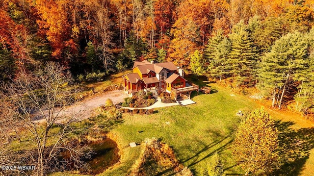 aerial view featuring a view of trees