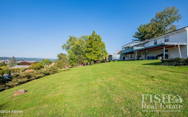 view of yard featuring a deck