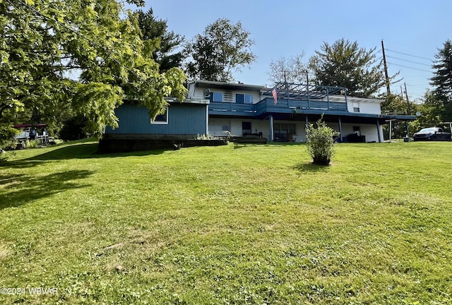 view of yard with a wooden deck