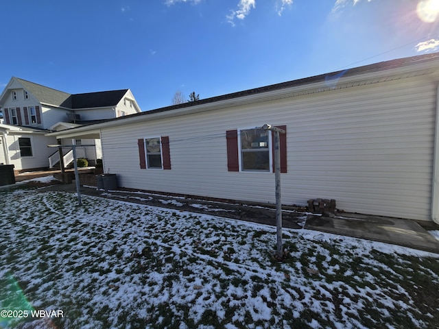 view of snow covered property