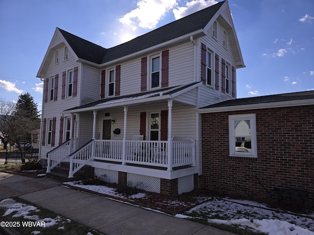 view of front of property featuring covered porch