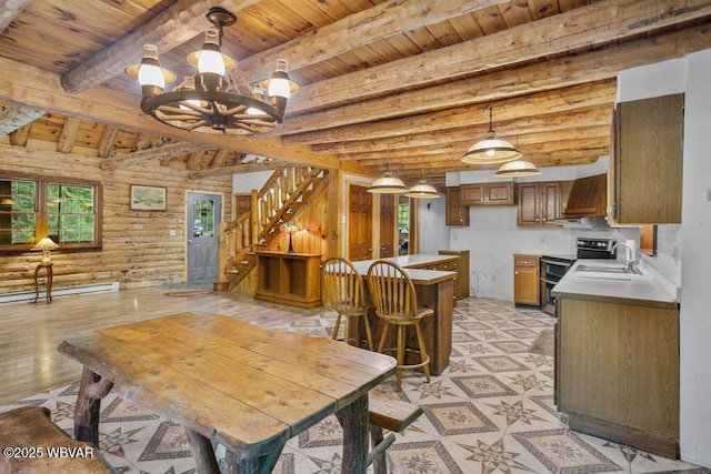 175 Hemlock Ln, Millville, PA 17846 - dining space featuring wooden ceiling with exposed beams, plenty of natural light, log walls, a chandelier, and stairs