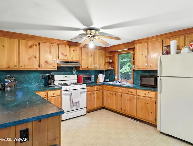 72 Carl Rd, Dushore, PA 18614 - kitchen featuring white appliances, under cabinet range hood, dark countertops, and open shelves