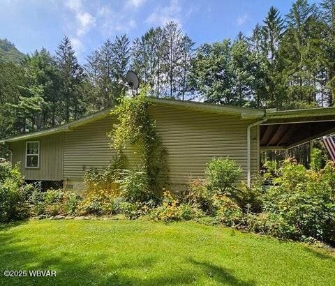 68 Sassafras Ln, Waterville, PA 17776 - view of home's exterior featuring a lawn