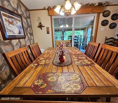 68 Sassafras Ln, Waterville, PA 17776 - dining area with ornamental molding and a notable chandelier
