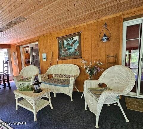 68 Sassafras Ln, Waterville, PA 17776 - sitting room featuring wooden walls and wood ceiling
