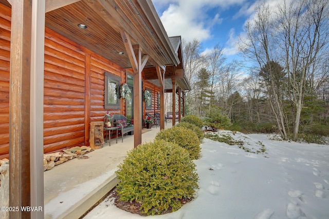 view of snow covered property