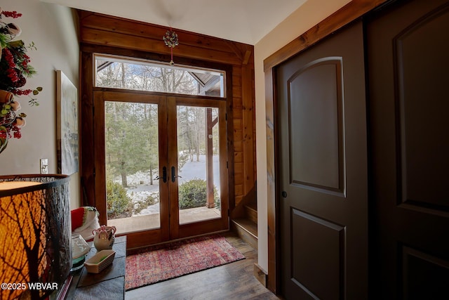 entryway featuring dark hardwood / wood-style flooring and french doors