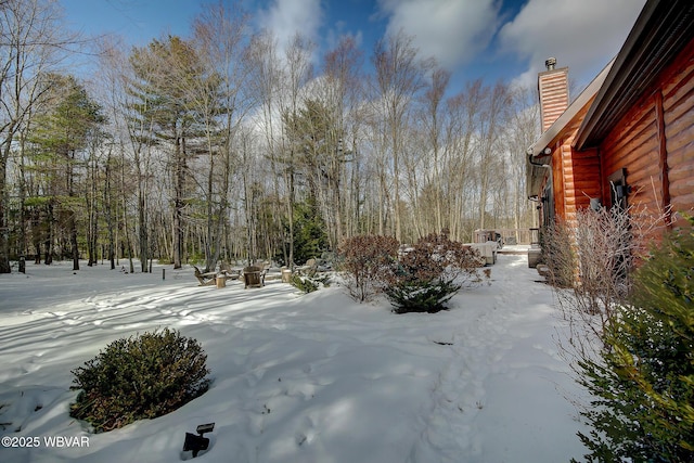 view of snowy yard