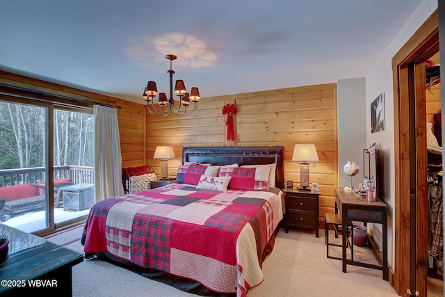 bedroom featuring an inviting chandelier, access to exterior, light colored carpet, and wood walls