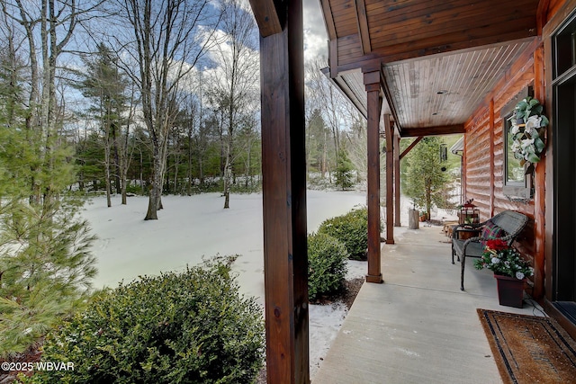 view of snow covered patio