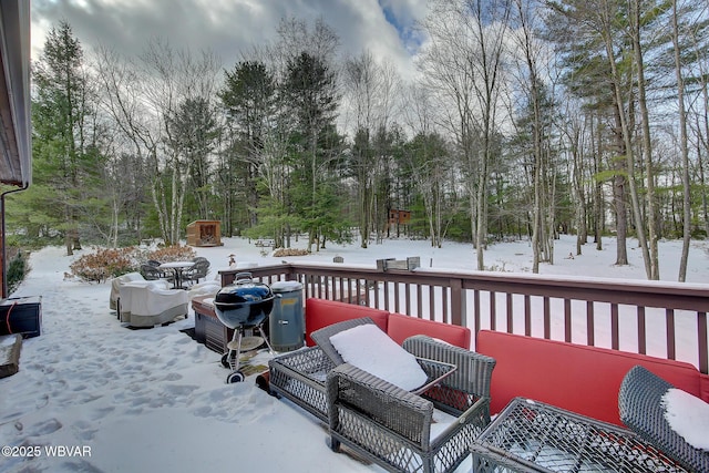 view of snow covered deck