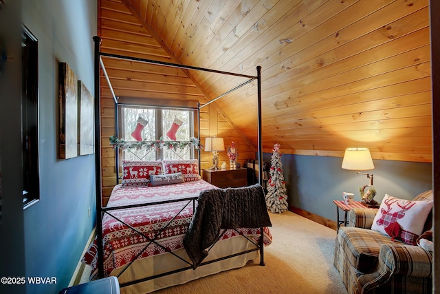 bedroom featuring vaulted ceiling, carpet floors, and wooden ceiling