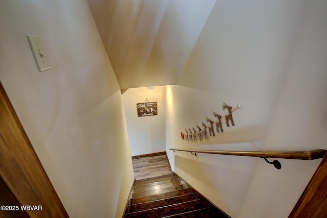 stairway featuring hardwood / wood-style floors